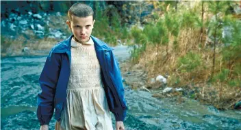  ??  ?? STRANGER THINGS. Millie Bobby Brown plays the powerful Eleven in “Stranger Things.” Screenwrit­er Matt Duffer calls Eleven the heart of the show.