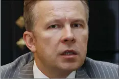  ?? AP PHOTO/ROMAN KOKSAROV ?? In this July 18 file photo, Governor of the Bank of Latvia Ilmars Rimsevics speaks during an interview with The Associated Press in Riga, Latvia. Latvia’s state broadcaste­r said Saturday, that the national anti-corruption agency raided the office and a...