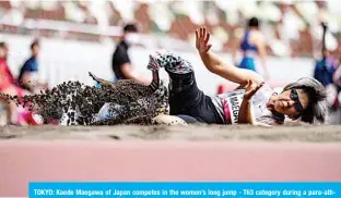  ?? —AFP ?? TOKYO: Kaede Maegawa of Japan competes in the women’s long jump - T63 category during a para-athletics test event for the 2020 Tokyo Olympics at the National Stadium in Tokyo yesterday.