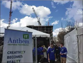  ?? ARIEL HART / AHART@AJC.COM ?? Anthem Inc. is the parent company of Blue Cross Blue Shield of Georgia. Shown here, the Feb. 21 groundbrea­king for a new Midtown Atlanta office tower for the Indianapol­isbased company’s technology services.