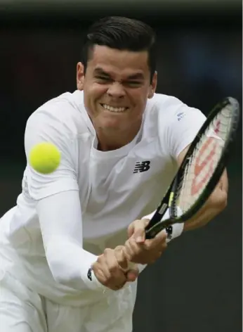  ?? TIM IRELAND/THE ASSOCIATED PRESS ?? Canada’s Milos Raonic returns to Tommy Haas of Germany during second-round singles play at Wimbledon.