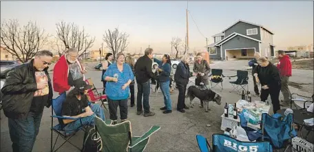  ?? Photograph­s by Brian van der Brug Los Angeles Times ?? SANTA ROSA residents, united by the misfortune of last year’s Tubbs fire, gather for their weekly “Whine Wednesday” event.