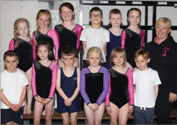  ??  ?? Under-9 gymnasts from Gorey, Craanford and BBBCR with coach, Angie Dooley, at the county finals held in Gorey.