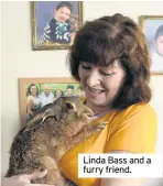  ??  ?? Linda Bass and a furry friend.