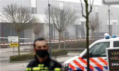  ??  ?? Emergency services personnel at the scene of the blast in Bovenkarsp­el. Photograph: Koen van Weel/EPA