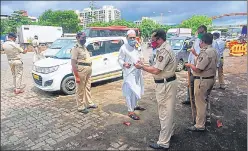  ??  ?? Police patrolling at Anand Nagar check naka in Thane.