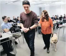  ?? ALLEN McINNIS ?? Tina Mintz travels the country with her dog, Keanna, to give sensitivit­y training classes like this one for students at Collège de Maisonneuv­e.