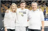  ??  ?? UCF guard Matt Milon’s parents, Abby and Wally, are professors at the university and able to attend all of the Knights’ home games.