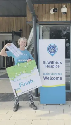  ??  ?? Kathy at the finish of her walk i n Chichester