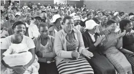  ??  ?? Women share a lighter moment during belated Women’s Day Commemorat­ions at Njube Hall in Bulawayo yesterday