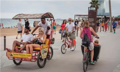  ??  ?? Rickshaws have been accused of focusing on tourism rather than contributi­ng to citizens’ mobility. Photograph: Andrea Baldo/Getty Images