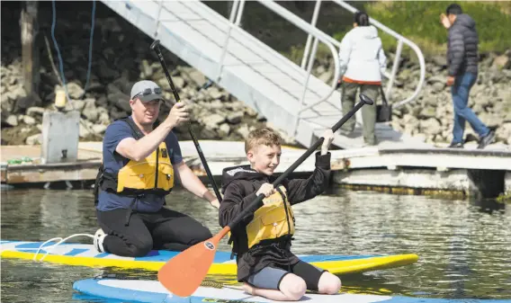  ??  ?? Above: Mike’s Paddle offers stand up paddleboar­ding classes and rentals. Below: The Little House Cafe is located in a century-old Colonial Revival house.