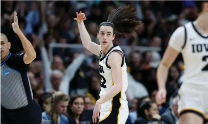  ?? ?? Caitlin Clark had 29 points and 15 assists to lead top-seeded Iowa to an 89-68 win over fifth-seeded Colorado on Saturday. Photograph: Sarah Stier/Getty Images