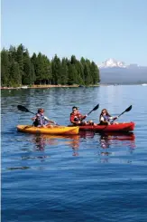  ??  ?? KAYAKING ON LAKE ALMANOR, above; Lava Beds National Monument, Valentine Cave entrance, bottom; Mount Shasta, opposite.