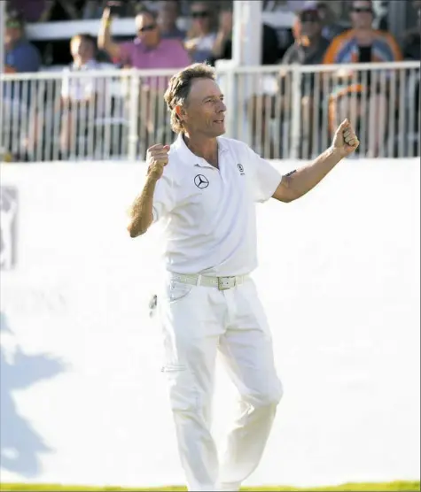  ?? Daniel Sangjib Min/Associated Press ?? Bernhard Langer celebrates his tournament-winning eagle on the 18th hole Sunday at the Dominion Energy Charity Classic.