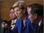  ?? Bloomberg photo by Andrew Harrer ?? At right, Sen. Elizabeth Warren, D-Mass., questions Richard Smith, former chairman and chief executive officer of Equifax, not pictured, during a Senate Banking Committee hearing in Washington last October. No other Democrat seems to get under the president’s skin quite like Warren, or to revel as much in the give and take, a fact chronicled in recent months as the two have exchanged cross-country Twitter taunts.