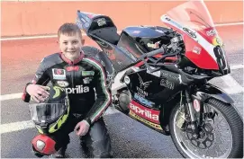  ??  ?? Harry Leigh (13) pictured with this season’s Aprilia RRV 450R.
