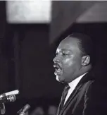  ?? CHARLES KELLY / AP ?? Dr. Martin Luther King Jr. makes his last public appearance at the Mason Temple in Memphis on April 3, 1968. The next day King was assassinat­ed on his motel balcony. Various activities are planned to honor the slain civil rights leader in Memphis on MLK Day this year.