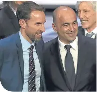  ??  ?? Gareth Southgate with Belgium manager Roberto Martinez at Friday’s World Cup draw