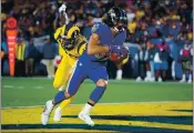  ?? DAVID CRANE — LOS ANGELES DAILY NEWS FILE ?? The Baltimore Ravens’ Willie Snead (83) scores as the Los Angeles Rams’ Marqui Christian (26) defends on the play during the second quarter at the Los Angeles Memorial Coliseum on Nov. 25, 2019.