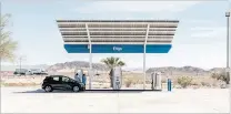  ?? PHILIP CHEUNG/NEW YORK TIMES ?? An electric vehicle charging station in Baker, Calif., in 2019. Documents suggest a Biden administra­tion plan would include nearly $1 trillion in spending alone on the constructi­on of roads, bridges, rail lines, and electric vehicle charging stations.