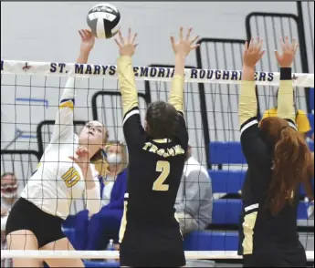  ?? Staff photo/Jake Dowling ?? St. Marys’ Halle Huston (10) hits the ball over the net during a non-league volleyball match against Botkins on Monday at Memorial High School.,