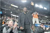  ?? EZRA SHAW — GETTY IMAGES, FILE ?? Former Giants player Barry Bonds waves to the crowd during Game 1 of the NLDS against the Dodgers on Oct. 8.