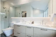  ??  ?? Stylish and sizable bathrooms are also included with the master suites.