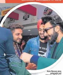  ??  ?? Actor Ranveer gives autographs and interacts with his fans at HT City