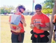  ??  ?? Luis Leyva joins a fellow canvasser last fall during one of many efforts in Sunland Park as part of the United We Dream Actions Live Unafraid Campaign.