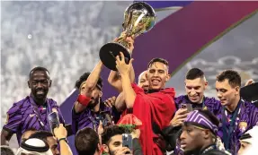  ?? Victor Besa / The National ?? Al Ain players after winning the Pro League Cup final against Shabab
Al Ahli at Mohamed bin Zayed Stadium in Abu Dhabi