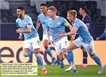  ?? — AFP ?? Manchester City’s Riyad Mahrez (left) celebrates after scoring against Paris Saint-Germain during their Champions League first leg semifinal in Paris on Wednesday.