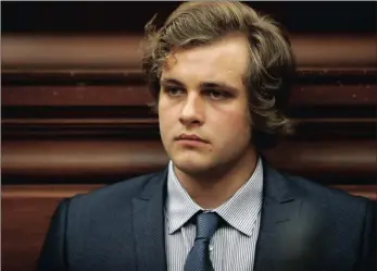  ??  ?? Triple murder accused Henri van Breda sits in the dock at the Western Cape High Court in Cape Town, on Wednesday. Van Breda is on trial accused of killing his parents and brother and injuring his sister at their home in Stellenbos­ch in 2015. If acquitted, Van Breda stands to inherit part of his family’s £2 million (R34.6m).