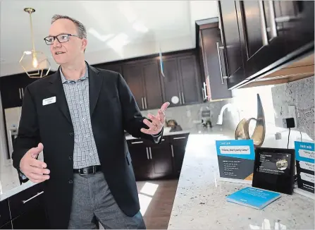  ?? ANDA CHU
TNS ?? Lennar Division President of the Bay Area Tom Burrill describes the features of Amazon Alexa devices featured in a model home on Mare Island in Vallejo, Calif.. Homebuilde­r Lennar has teamed up with Amazon to offer homes with Alexa technology included.