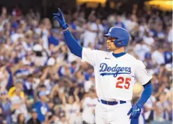  ?? KYUSUNG GONG/ASSOCIATED PRESS ?? Trayce Thompson of the Dodgers gestures toward the stands after his goahead, three-run home run in the fifth inning Monday night against Colorado. Los Angeles came back to win, 5-3 at Dodger Stadium.