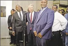  ??  ?? Manhattan DA Cy Vance Jr. (center) on Monday moved to toss 1991 conviction­s of VanDyke Perry (left) and Gregory Counts (front, right).