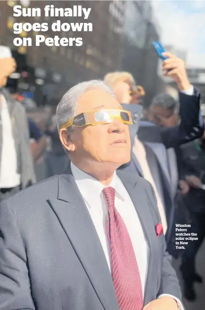  ?? ?? Winston Peters watches the solar eclipse in New York.
