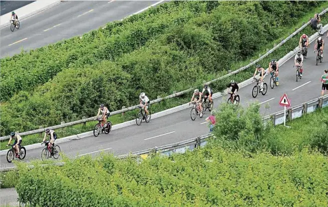  ?? Foto: Serge Waldbillig ?? Der Ironman 70.3 in Remich überzeugt vor allem durch die Strecke mitten in der Natur.