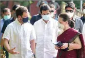  ?? PTI/FILE ?? Congress President Sonia Gandhi with party leaders Rahul Gandhi and KC Venugopal arrives for the Congress Working Committee meeting, at the AICC headquarte­rs, in New Delhi