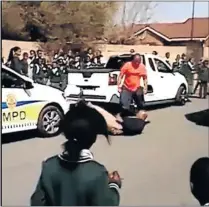  ??  ?? The unfortunat­e video showing a traffic police officer on duty being assaulted by a motorist.