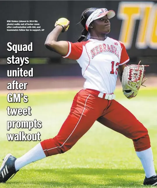  ??  ?? Kiki Stokes (shown in 2014 file photo) walks out of locker room after confrontat­ion with GM, and teammates follow her in support. AP