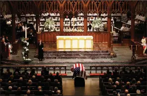  ?? AP/MARK HUMPHREY ?? Country performer Reba McEntire sings The Lord’s Prayer during services Thursday for former President George H.W. Bush at St. Martin’s Episcopal Church in Houston.