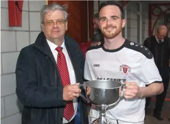  ??  ?? Noel Scott and Fabio Cretaro, captain of Real Tubber after their win.