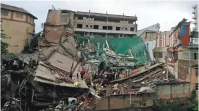  ?? ERANGA JAYAWARDEN­A, AP ?? Sri Lankan military rescuers and firefighte­rs search for trapped people Thursday in the debris of a five-story building under constructi­on that collapsed in Colombo, Sri Lanka. The reason for the collapse was not immediatel­y known.