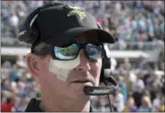  ?? PHELAN M. EBENHACK — THE ASSOCIATED PRESS FILE ?? Minnesota Vikings head coach Mike Zimmer wears an eye patch over his right eye during the first half of an NFL football game against the Jacksonvil­le Jaguars in Jacksonvil­le, Fla., on Dec. 11. Zimmer says he is not going to let the lingering eye issues...