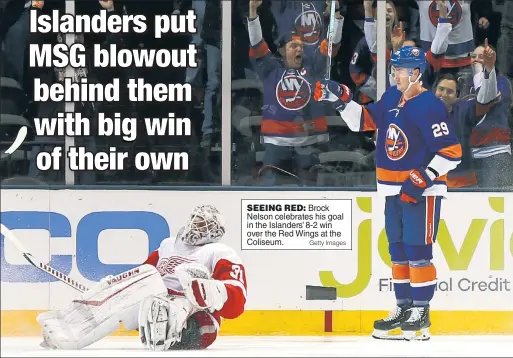  ?? Getty Images ?? SEEING RED: Brock Nelson celebrates his goal in the Islanders’ 8-2 win over the Red Wings at the Coliseum.