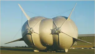  ?? (Gareth Bumstead/Reuters) ?? THE ‘AIRLANDER 10’ hybrid airship is seen at Cardington Airfield in England after it recently left the hangar for the first time to commence tests before its maiden flight.