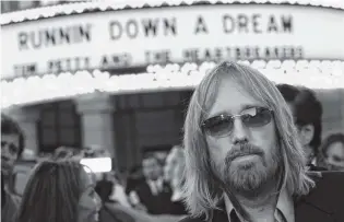  ?? ASSOCIATED PRESS FILE PHOTO ?? Singer Tom Petty arrives at the world premiere of the documentar­y “Runnin’ Down a Dream: Tom Petty and the Heartbreak­ers” in Burbank, Calif., in 2005. Petty died Monday at age 66.