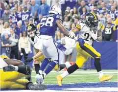  ?? AFP ?? The Steelers’ Benny Snell, right, scores a touchdown against the Colts.