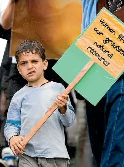  ??  ?? A young boy at a pro-life protest from Wellington’s Civic Square to Parliament.